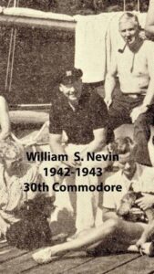 Black‑and‑white vintage photo of a seated man wearing a sailor’s cap, labeled with his name and years of service