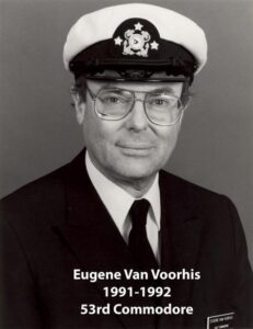 Portrait of a man in a yacht club commodore uniform with a white cap and dark jacket